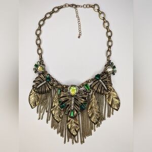 Bronze brass tone with emerald and crystal color gems monstera leaf necklace